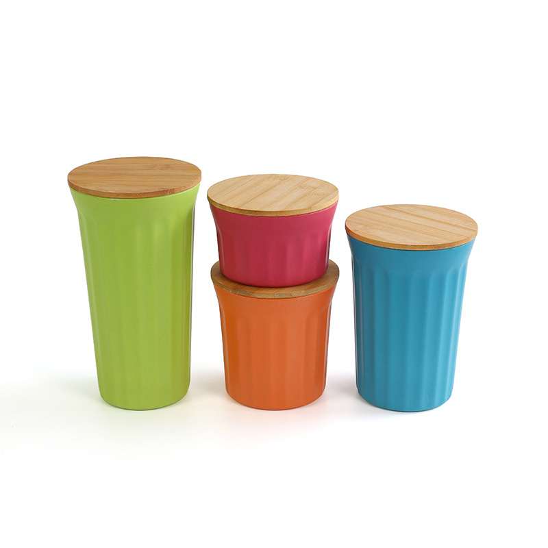 Set of four vertical bamboo powder storage jars